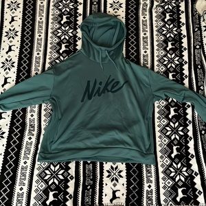 Teal Nike sweatshirt but it’s a little cropped. Too big for me